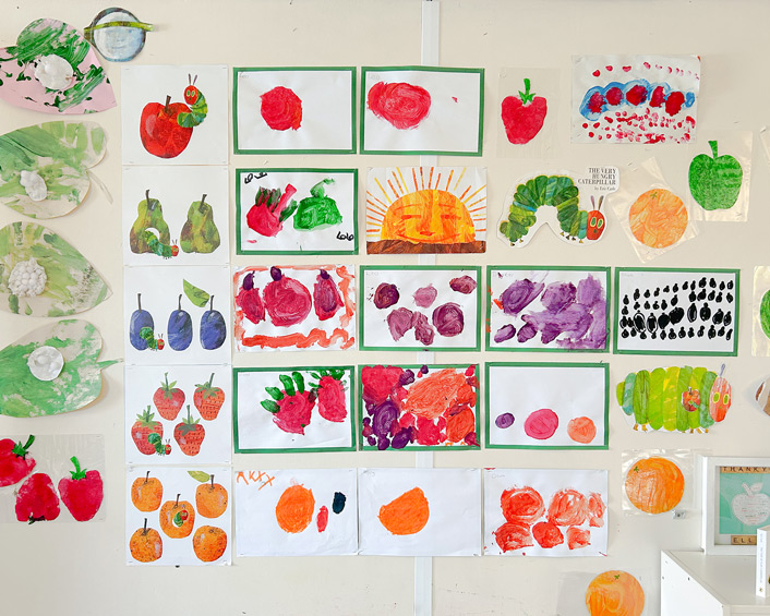 a display of children's artwork from 'The Hungry Caterpillar'